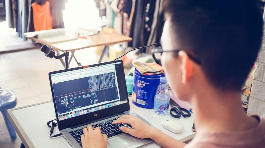 person using black laptop computer